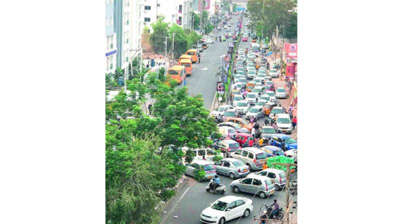 Massive traffic jam at the new junction near B. R. Ambedkar open University towards Madhapur