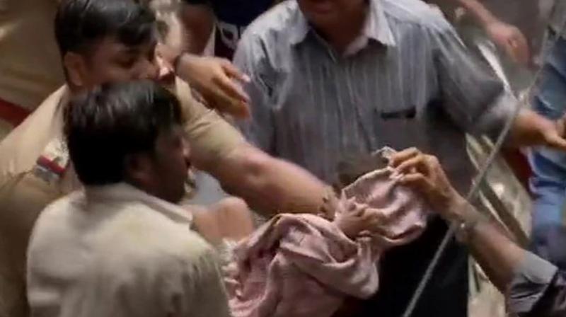 Mumbai building collapse: Toddler wrapped in cloth rescued