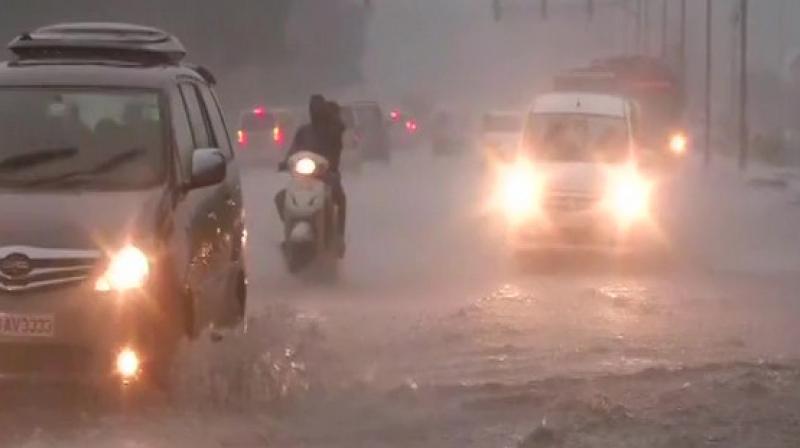 Rain lashes parts of Delhi, temperature dips to 27 degrees