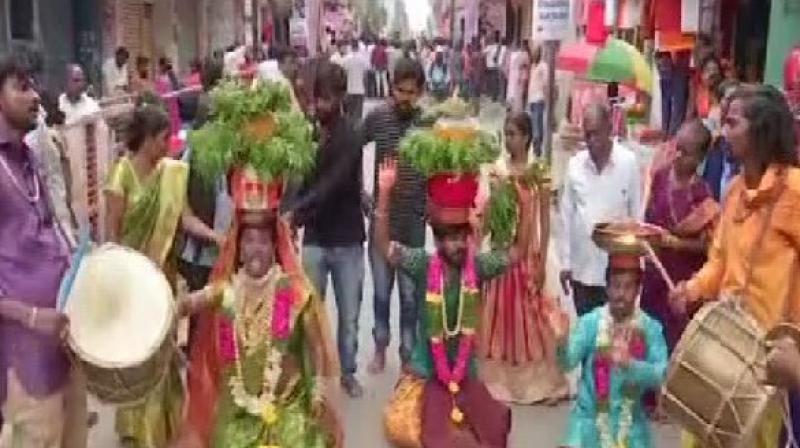 Telangana: Devotees throng Mahankali temple to celebrate Bonalu festival