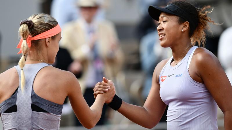 French Open: Naomi Osaka earns a hard fought 0-6, 7-6(4), 6-1 victory vs Schmiedlova