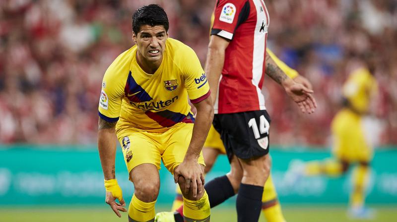 Barcelona confirm Suarez suffered leg injury in La Liga opener