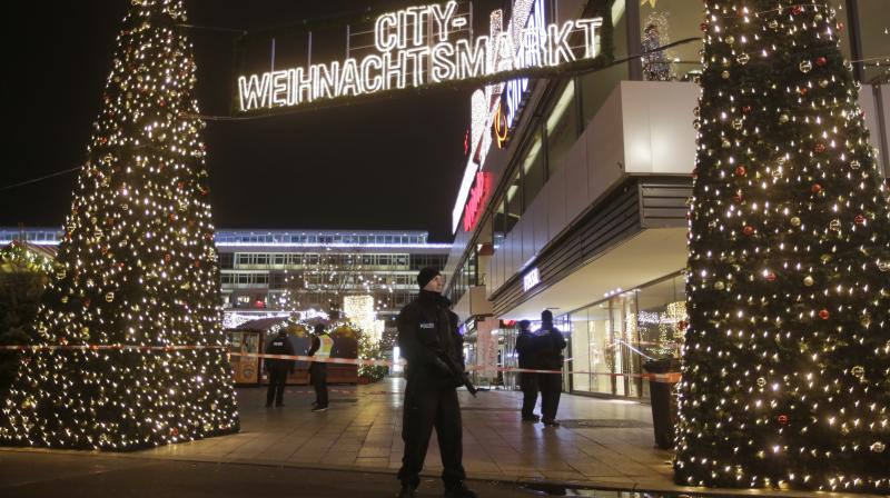 A lorry ploughed into a busy Christmas market in Berlin, killing at least 12 people and injuring dozens more in what police said was a suspected terror attack.