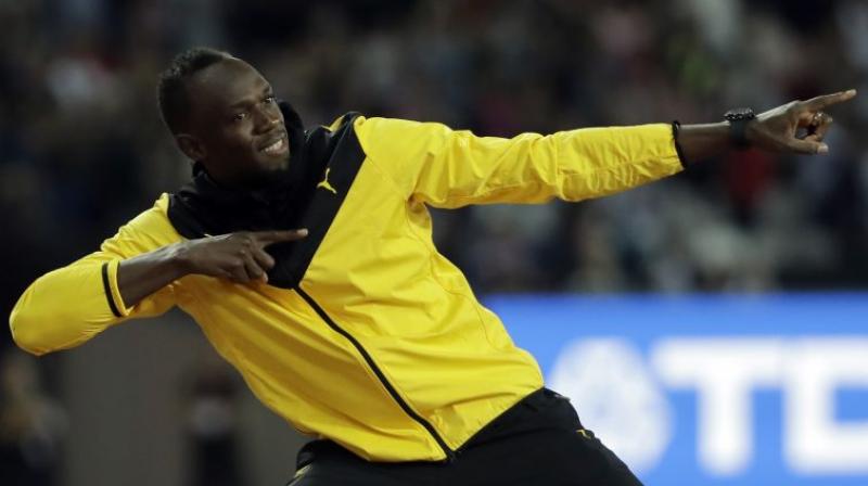 Usain  Bolt said that he is a big fan of Cristiano Ronaldo, but he has more in common with Lionel Messi, saying they both benefited from a natural ability. (Photo:AP)