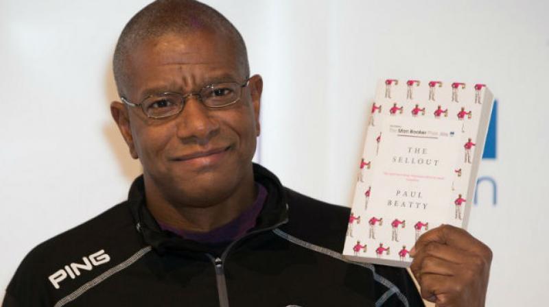 Paul Beatty poses for a photograph at a photocall in London on October 24. (Photo: AFP)