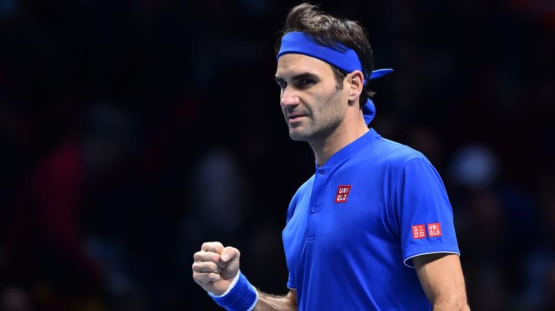 Roger Federer staved off elimination from the ATP Finals as the six-time champion eased to a 6-2, 6-3 win over Dominic Thiem. (Photo: AFP)