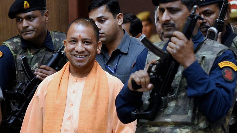 UP Chief Minister Yogi Adityanath coming out after the cabinet meeting at Lok Bhawan in Lucknow. (Photo: PTI)