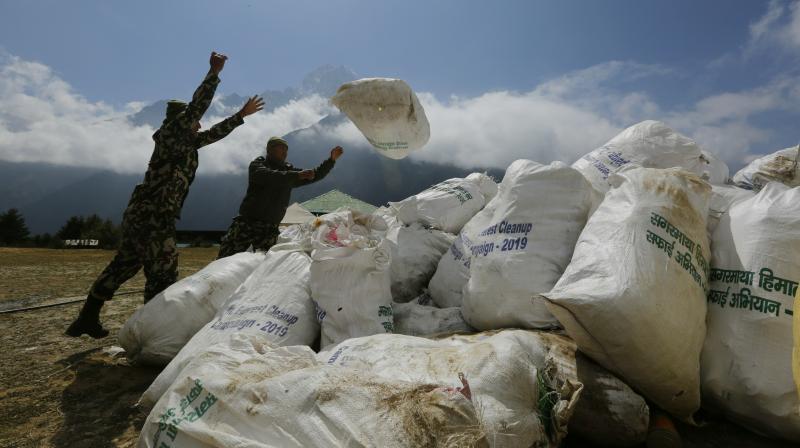 Sherpas clean up 24,000 pounds of garbage from Mount Everest