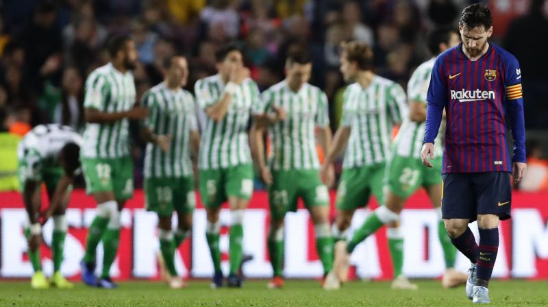 Lionel Messi scored from close range in stoppage time but Betis hung on to clinch a first league win at the Nou Camp since 1998. (Photo: AP)