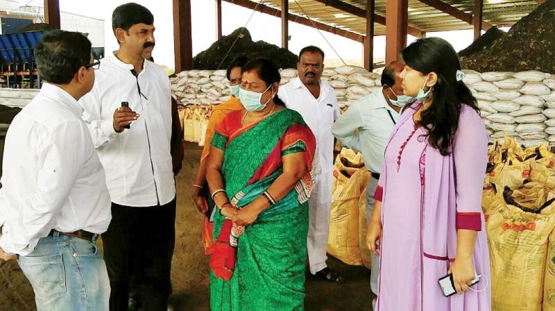 Mayor Padmavathi along with other officials inspects a solid waste treatment plant in Doddaballapur in Bengaluru on Thursday 	(Photo: DC)