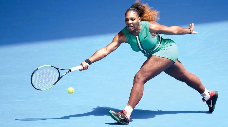 Serena Williams of the US en route to her 6-0, 6-2 win over Tatjana Maria of Germany in their Australian Open first round match in Melbourne on Tuesday. (Photo: AFP)