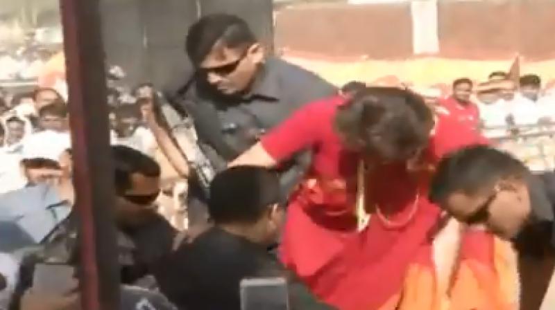 Watch: Like Indira Gandhi, Priyanka jumps over barricade to meet public after rally