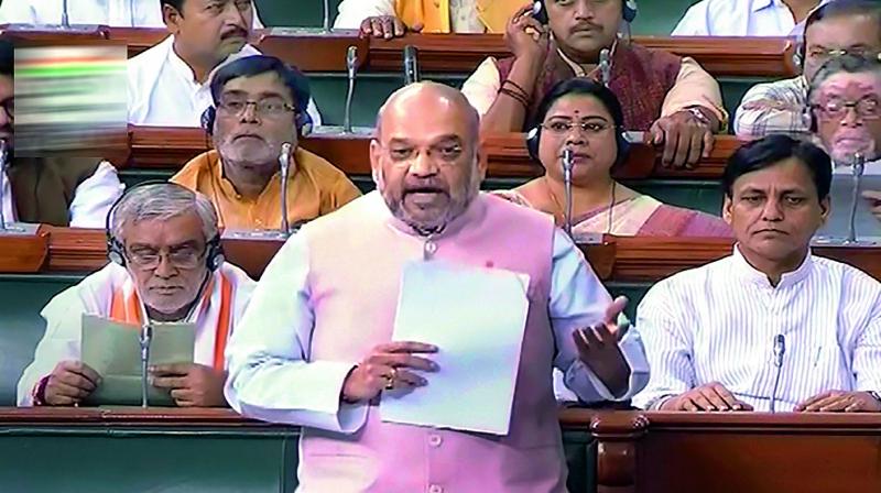 Union home minister Amit Shah speaks in the Lok Sabha during the Budget Session of Parliament on Friday. (Photo: PTI)