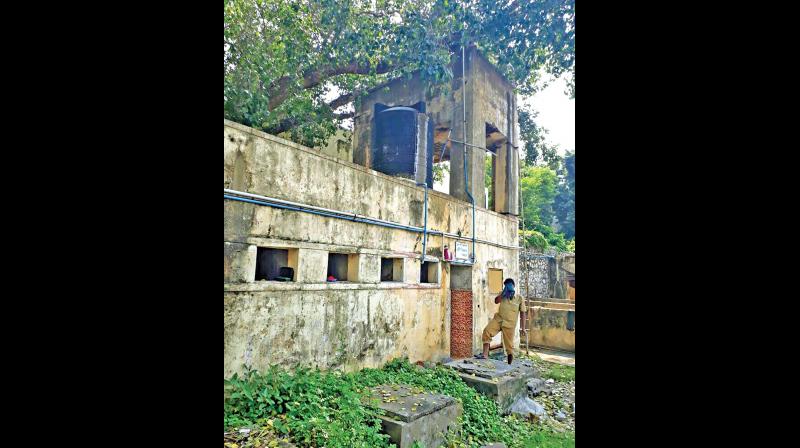 The washroom at Vadapalani bus depot in a state of neglect. (Photo: DC)