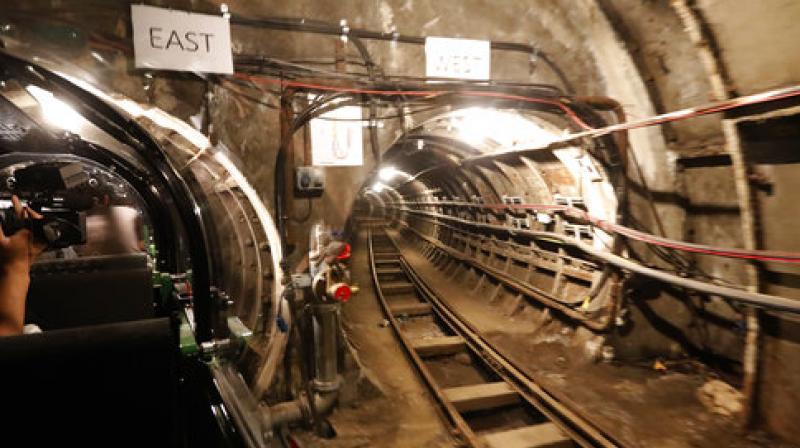 A cameraman films the Mail Rail tunnels that belong to the Postal Museum in London, Wednesday, July 26, 2017. (Photo: AP)
