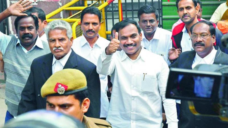 Former telecom minister A. Raja gestures after his acquittal. (Photo: PTI)