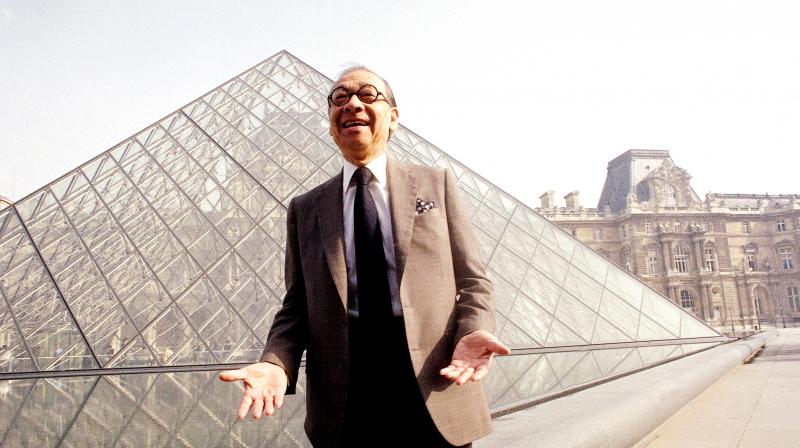 Chinese-American architect I M Pei posing for a portrait in front of the Louvre glass pyramid, which he designed, in the museums Napoleon Courtyard, prior to its inauguration in Paris. (Photo: AP)