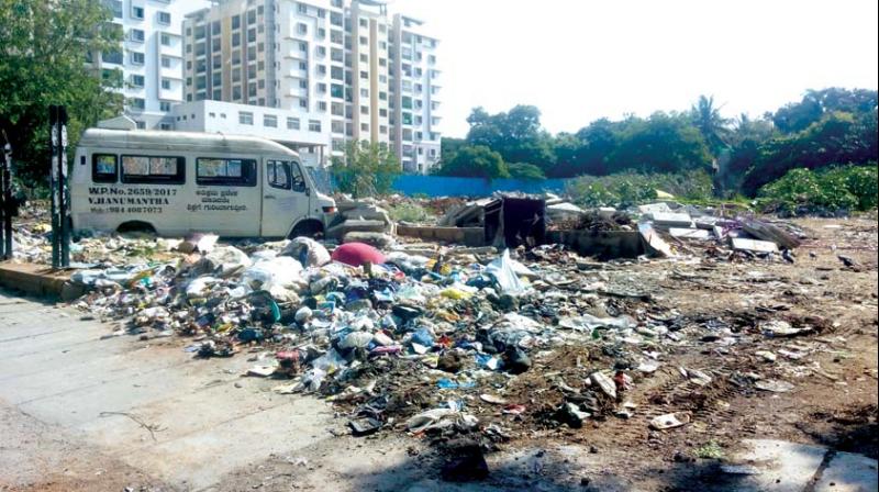 Garbage dumped on a vacant site in BTM Layout	(Photo: DC)