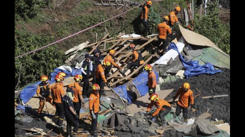 The interior ministry said the nine dead included six people who were buried by landslides. It said another seven people were injured in typhoon-related incidents and that about 310 people were displaced from their homes. (Photo: AP)