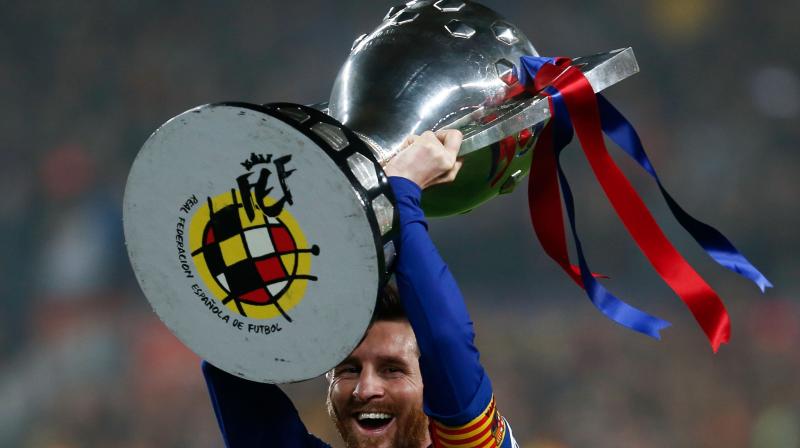 Messi steers Barcelona to another La Liga title