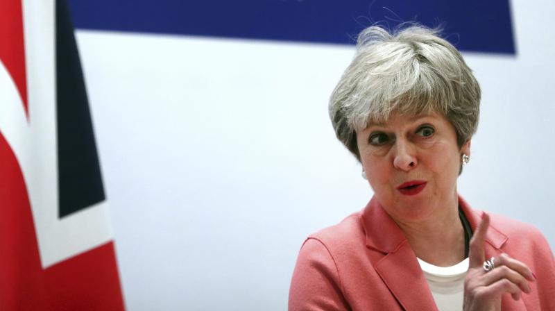 Theresa May urged to set her exit date to get Brexit deal through