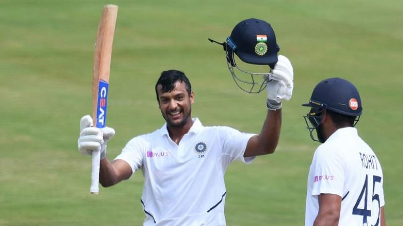 Mayank Agarwal completed his maiden Test hundred while Rohit Sharma made 176 on his opening debut as India headed towards a huge first innings total at lunch on day two of the series opener against South Africa here on Thursday. (Photo:AFP)