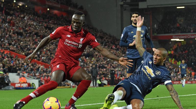 Senegal winger Mane put Liverpool ahead in the 24th minute when he broke away from Ashley Young to meet Fabinhos sublime pass with a nimble piece of chest control before shooting past David De Gea. (Photo: AFP)