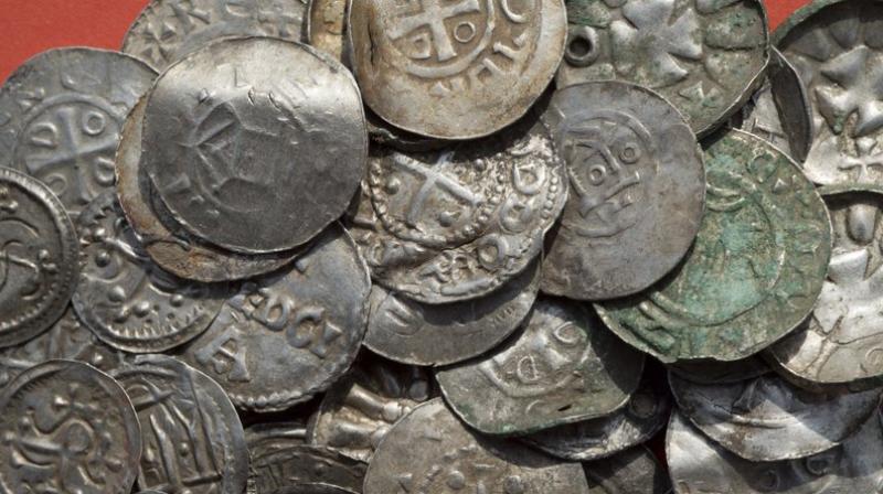The photo shows medieval Saxonian, Ottoman, Danish and Byzantine coins after a medieval silver treasure had been found near Schaprode on the northern German island of Ruegen in the Baltic Sea.