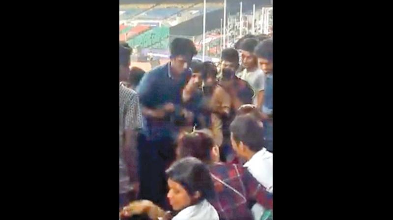 A screen shot of the video of youth harassing a group of girls from Northeast at Nehru stadium.