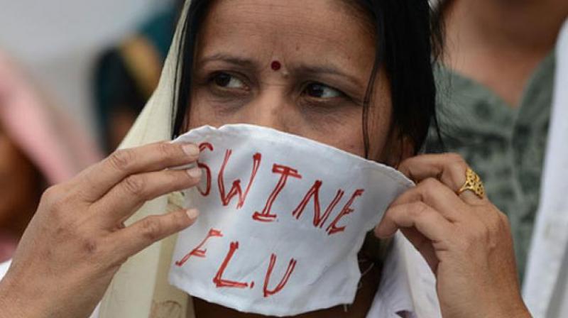 The symptoms of swine flu are fever, cough, fatigue, diarrhoea and vomiting along with flu.   (Representational photo)