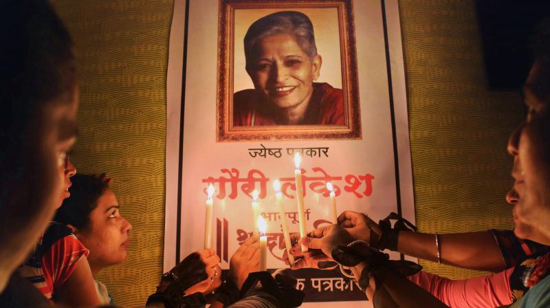 Journalists pay tributes to journalist Gauri Lankesh in Mumbai on Wednesday. (Photo: PTI)