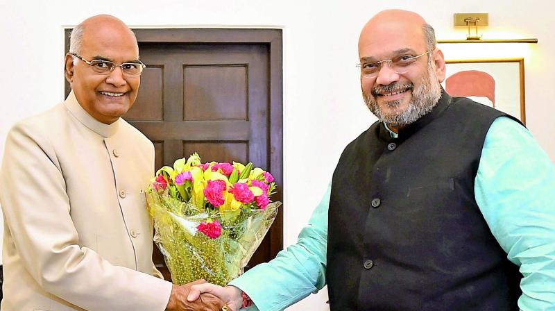 Bihar Governor Ram Nath Kovind meets BJP president Amit Shah in New Delhi on Monday. (Photo: PTI)