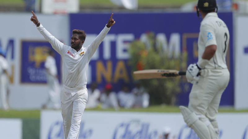 Sri Lankan spinner Akila Dananjaya banned from bowling for 12 months