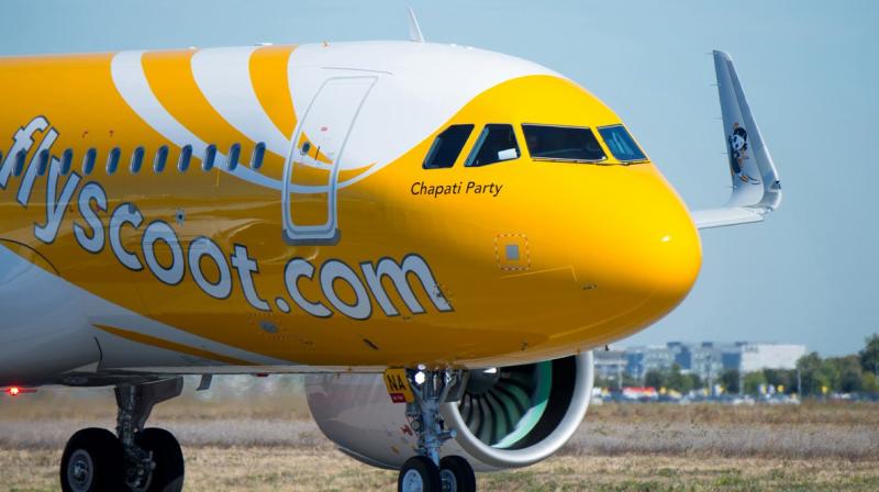 The business class passenger on board a Scoot flight also caressed the attendants left hip, The Straits Times reported. (Photo: Twitter | @flyscoot)