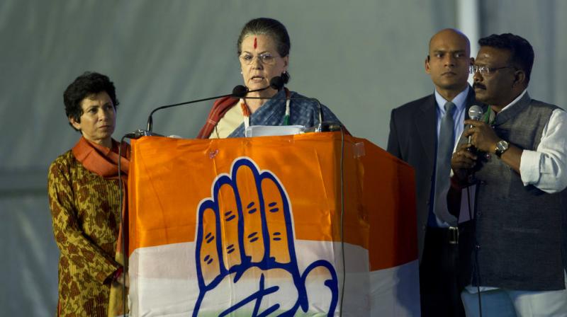 UPA chairperson Sonia Gandhi addresses an election campaign rally at Medchal, on the outskirt of Hyderabad. (Photo: AP)