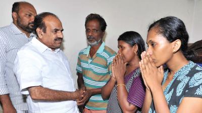 CPM state secretary Kodiyeri Balakrishnan meets Sreejith's parents and wife. CPM district secretary P. Rajeev is also seen.