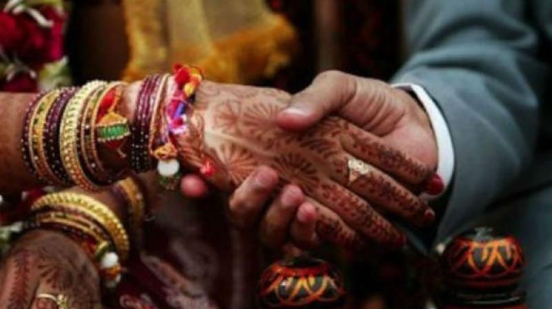 Attitudes on inter-faith marriage must change