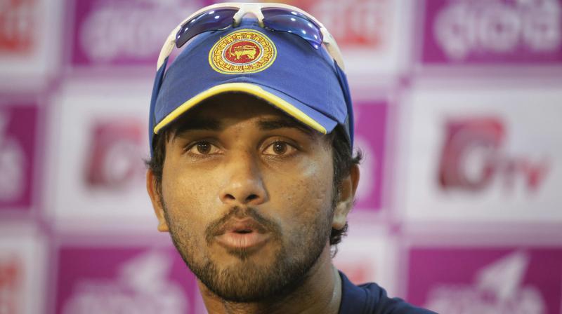 The Sri Lanka captain got two suspension points and was fined 100 per cent of his match fee. (Photo: AP)