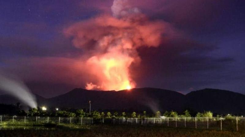 Images showed an eruption visible for miles around, with a cloud of ash climbing in a large vertical column with a mushroom-shaped top. (Photo: AP)