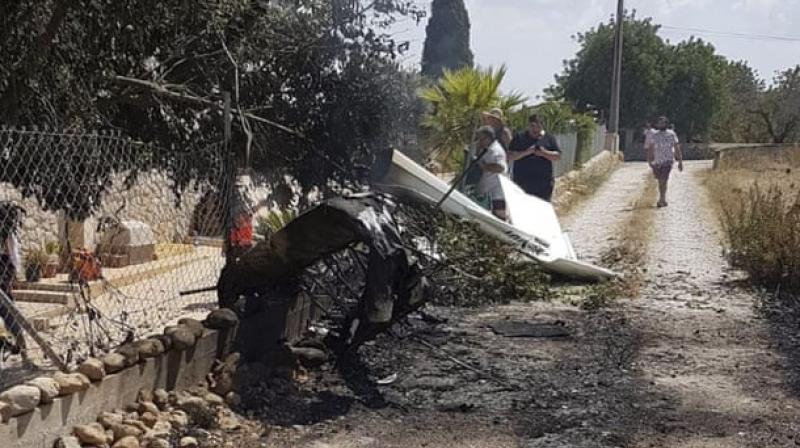 7 including 2 children dead in mid-air collision between plane, chopper in Spain