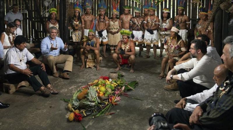 Amazon nations meet in indigenous hut at Colombia over forest protection