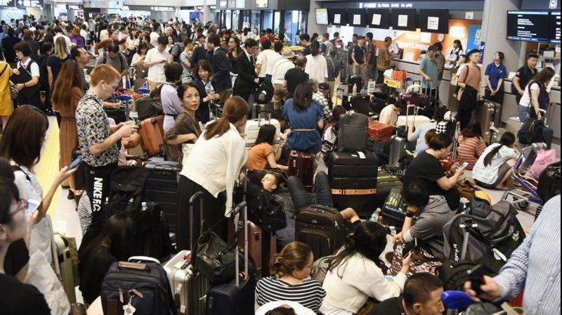 17,000 people stranded at Tokyo airport due to Typhoon