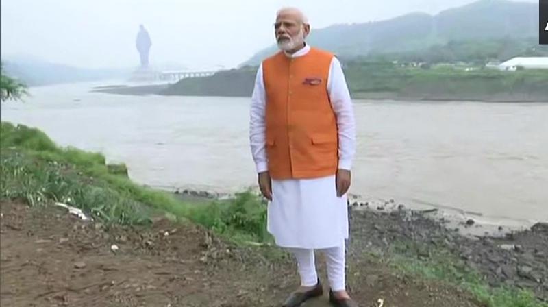 Prime Minister Narendra Modi, who turned 69, reached the Sardar Sarovar Dam around 8:45 am on Wednesday to celebrate his birthday in home state Gujarat. (Photo: Twitter/ ANI)