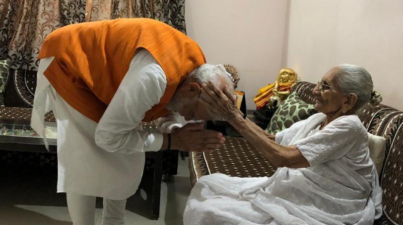 PM Modi visits mother to seek blessings on 69th birthday