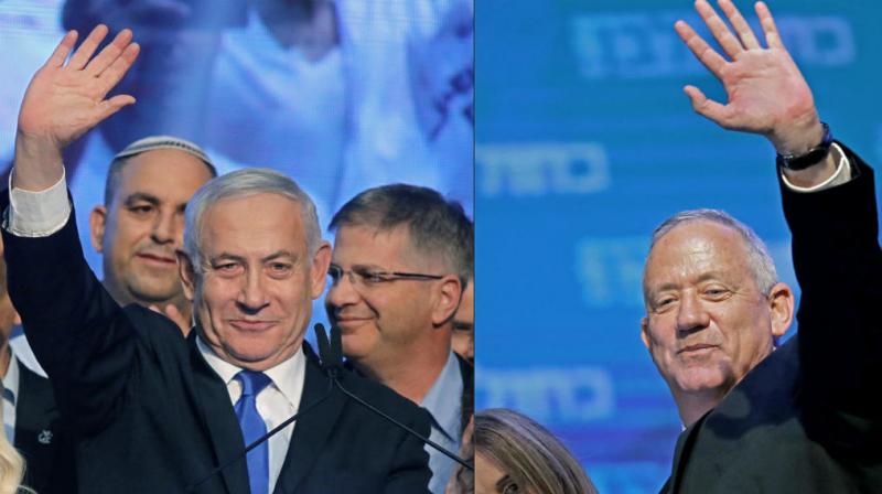Israels embattled Prime Minister Benjamin Netanyahu on Thursday called on his main challenger Benny Gantz to form a unity government together to avoid a third election, as results of the unprecedented repeat election left the countrys two main political parties deadlocked. (Photo: AFP)