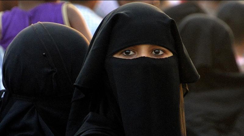 Muslim education group chief receives death threat over ban on face-covering attire