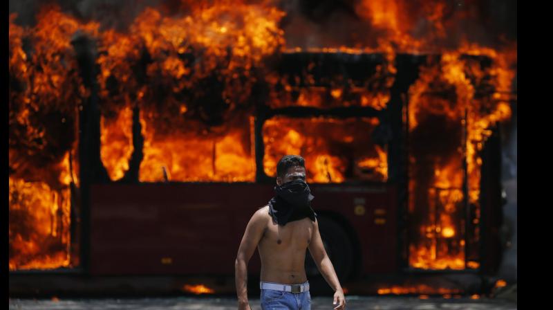 Venezuela faces crises, riots amidst \attempted coup\