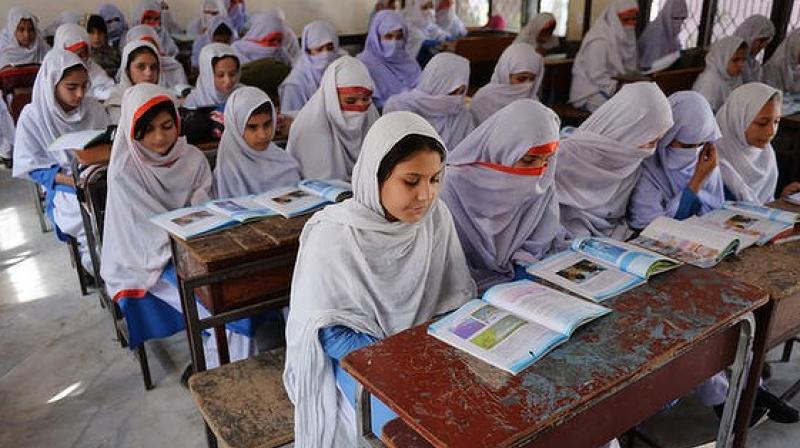 Just by giving girls lessons in puberty or a purpose-built sanitary pad means they were more likely to stay at school during their periods (Photo: AFP)