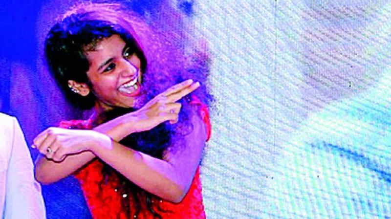 Priya Prakash Warrier, the 18-year-old actress, who became an internet sensation overnight, has been hauled into trouble hours after her wink video of a film insanely went viral.