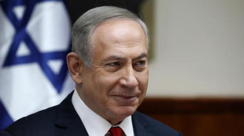 Israel hits Gaza after rocket sirens force Benjamin Netanyahu off stage